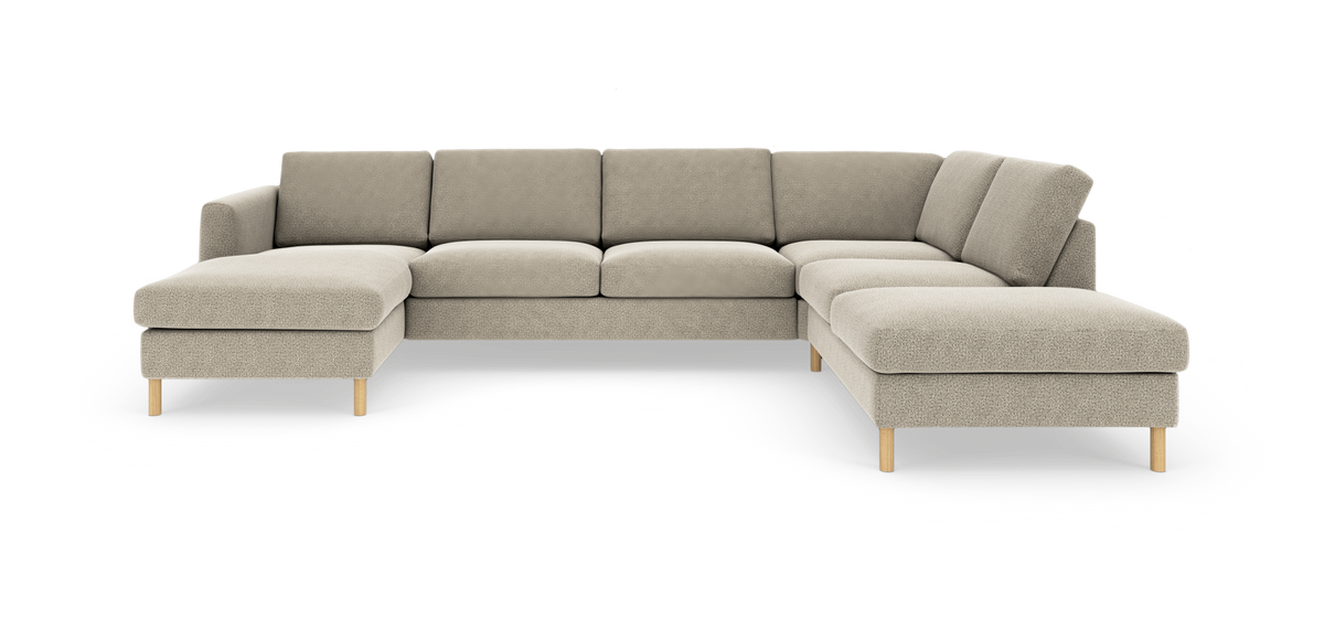 Beige U‑formet modulsofa med chaiselonger på begge sider, træben og bløde puder på hvid baggrund.