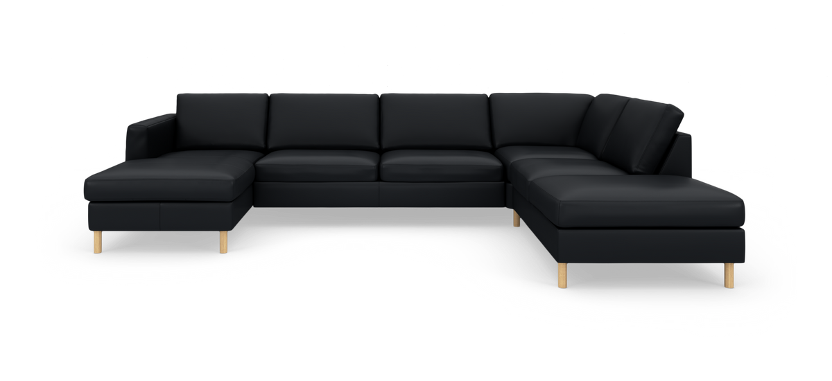 Sort L‑formet modulsofa med chaiselong og lyse træben, fritlagt på hvid baggrund.