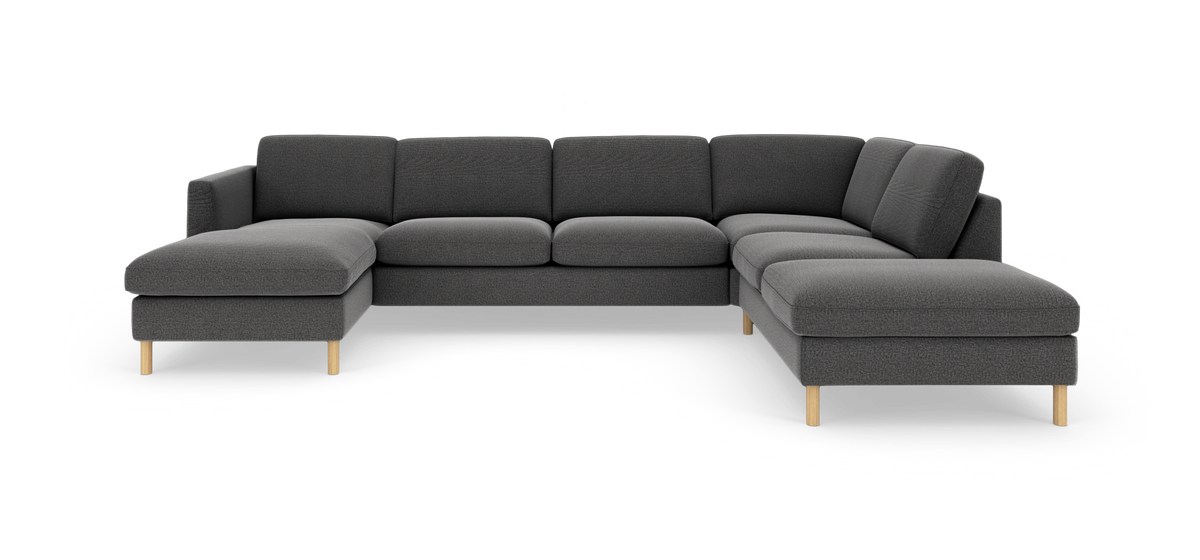 Mørkegrå modul hjørnesofa med chaiselong venstre og træben, frilagt på hvid studiobaggrund.