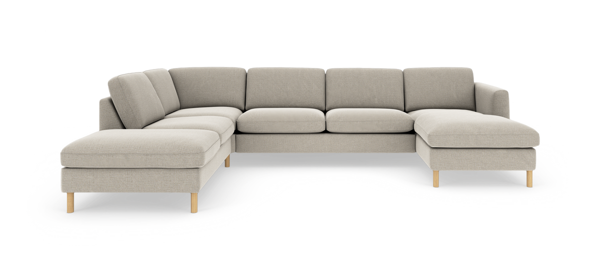 Lys beige modulsofa i U‑form med træben, isoleret på hvid baggrund.