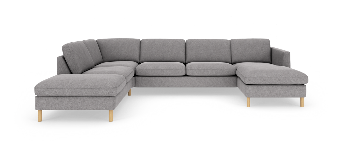 Grå L-formet modulsofa med chaiselong i højre side, fritstående på hvid baggrund.