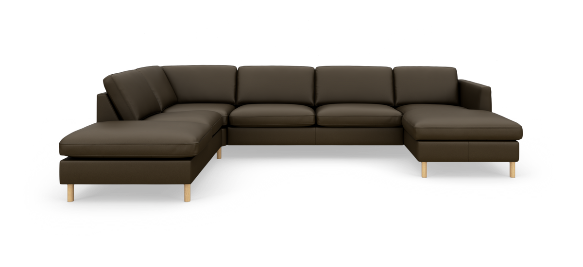 Stor L-formet modulsofa i mørkebrunt læder med træben, vist på hvid studiobaggrund.