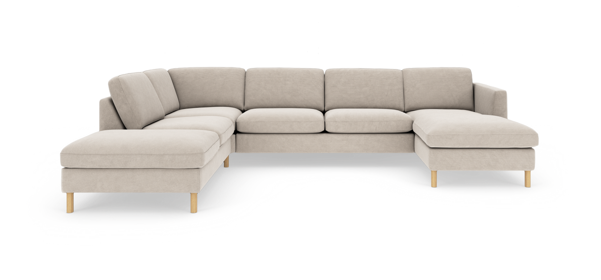 Lys beige U-formet modulsofa med chaiselonger på både venstre og højre side, med lyse træben.