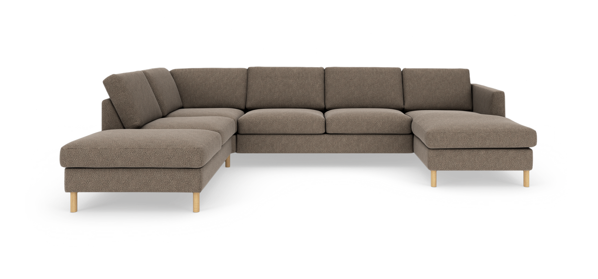 Brun L‑formet modulsofa med to chaiselonger og lyse træben, fritstående på hvid baggrund.
