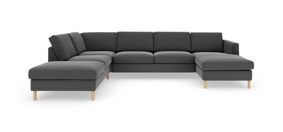 Mørkegrå U‑formet hjørnesofa med chaiselonger i begge ender og lyse træben på hvid baggrund.