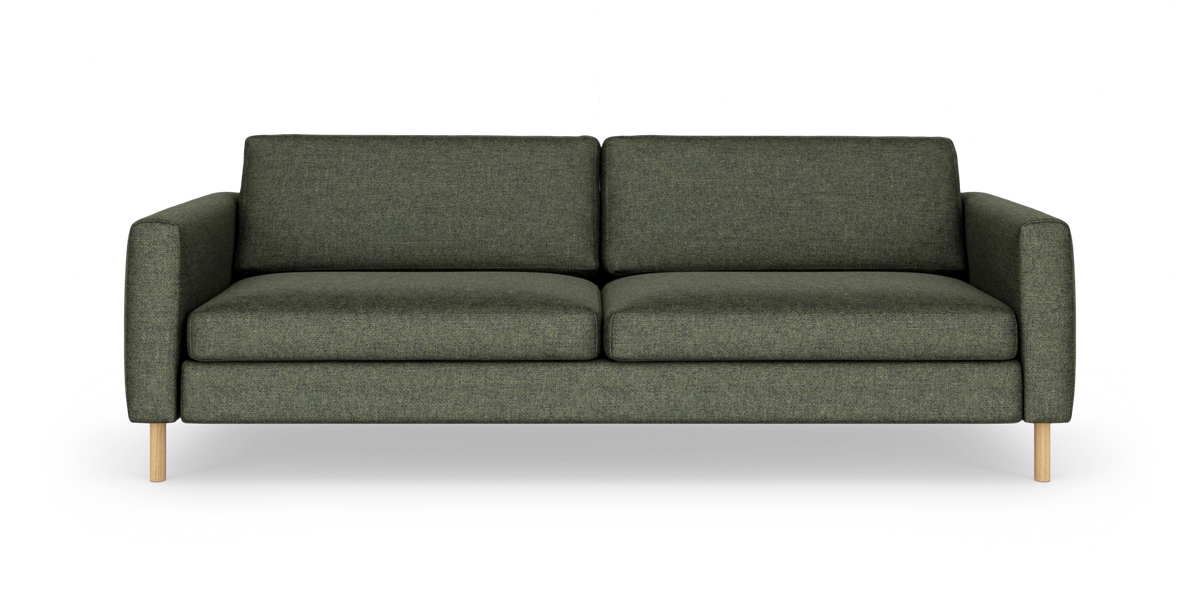 Grøn sofa med to sædehynder på hvid baggrund.