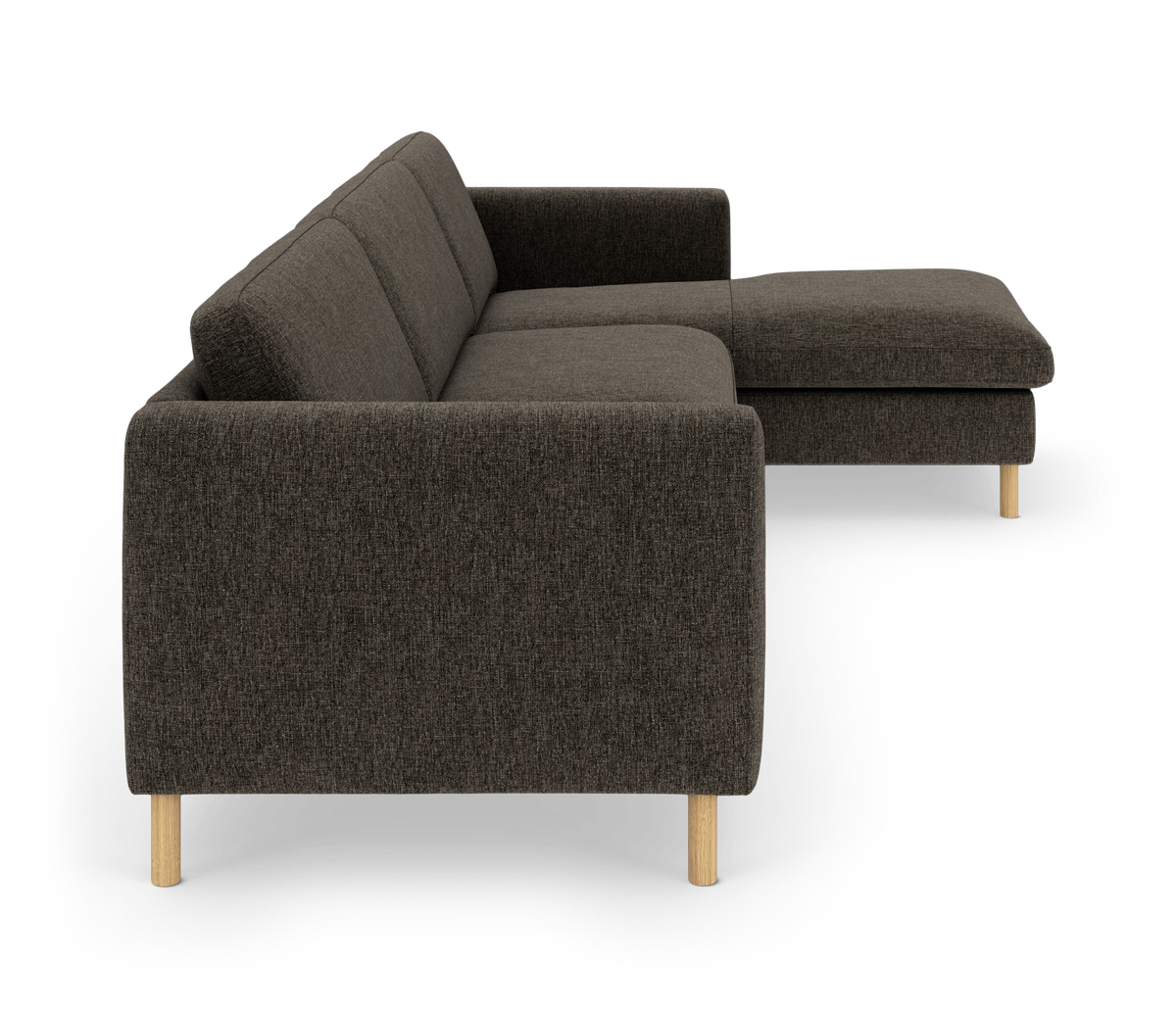 Mørkegrå hjørnesofa med chaiselong og lyse træben set fra siden.