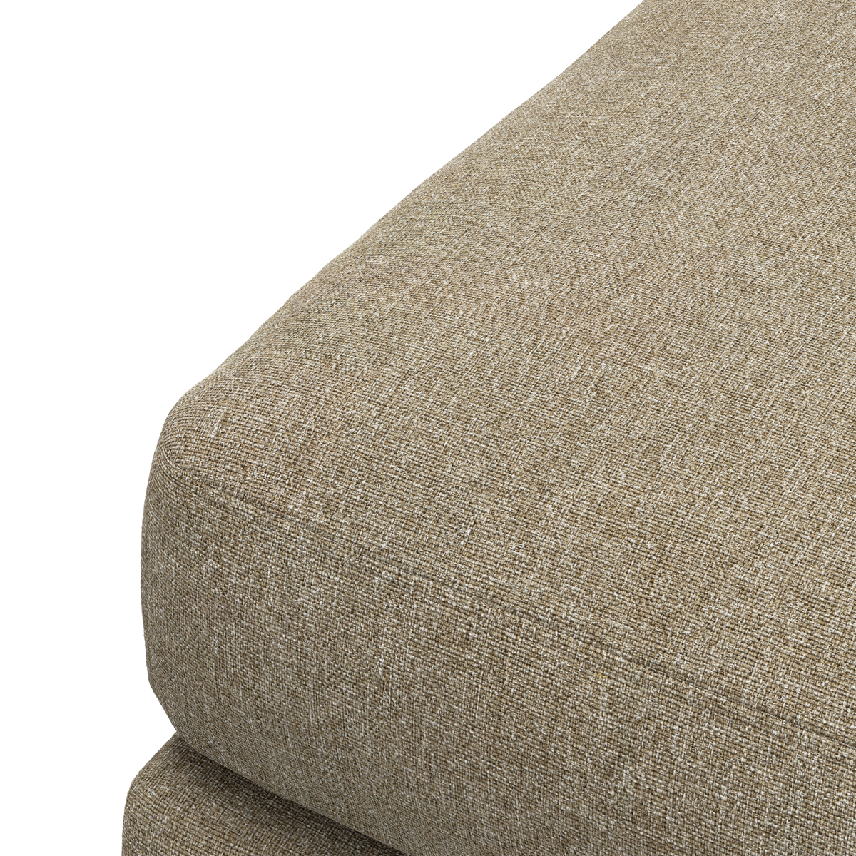 Nærbillede af beige sofahynde med meleret tekstur.