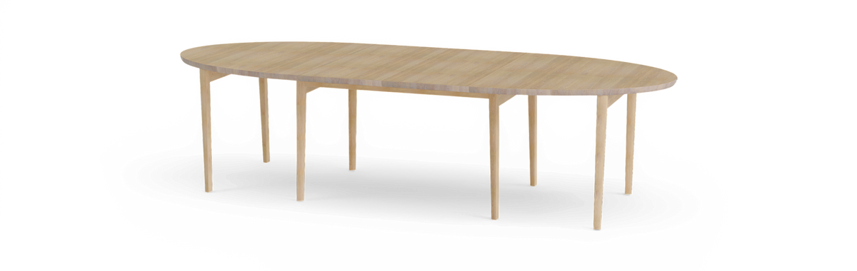 Ovalt spisebord i lyst træ med otte slanke ben.