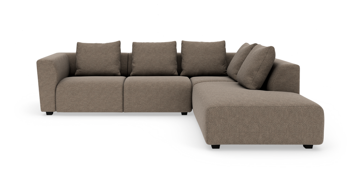 Modulær hjørnesofa i taupe med højre chaiselong og løse ryghynder.