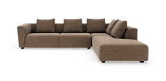 Brun modulsofa i L‑form med brede armlæn og løse ryghynder, frilagt på hvid baggrund.