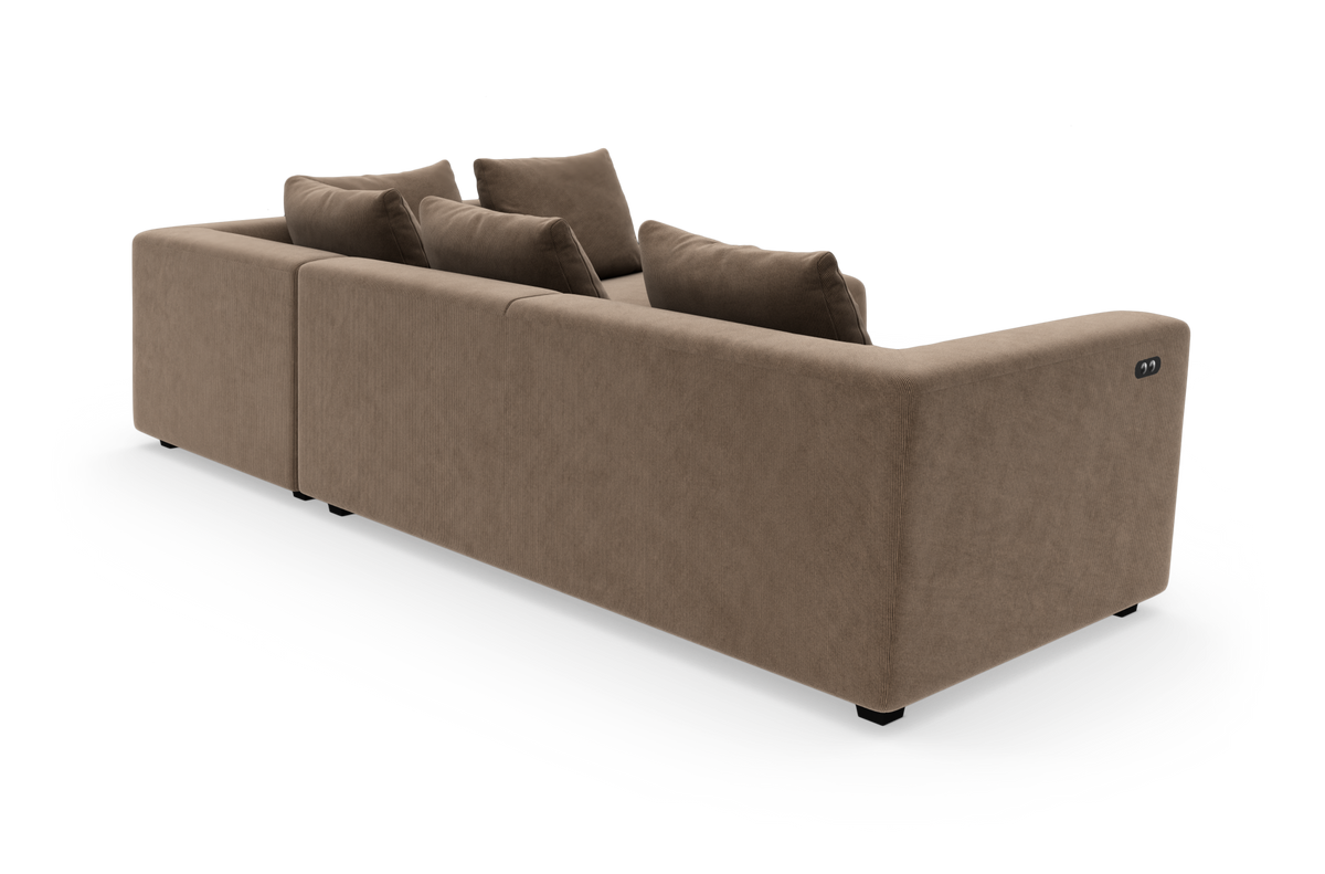 Brun modulsofa set bagfra i studie med flere rygpuder.