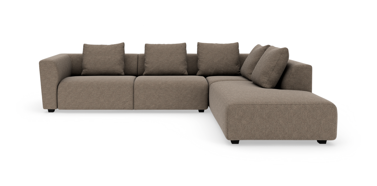 Brun L-formet modulsofa med chaiselong til højre og fem ryghynder.