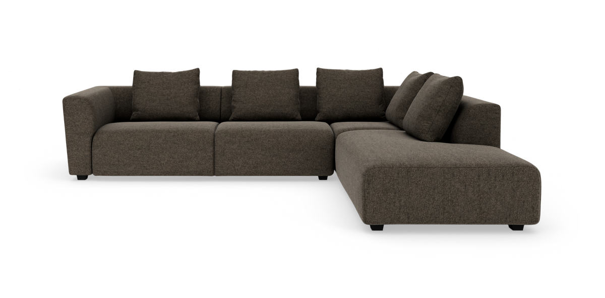 Mørk brun modulsofa med højre chaiselong og løse ryghynder på hvid baggrund.