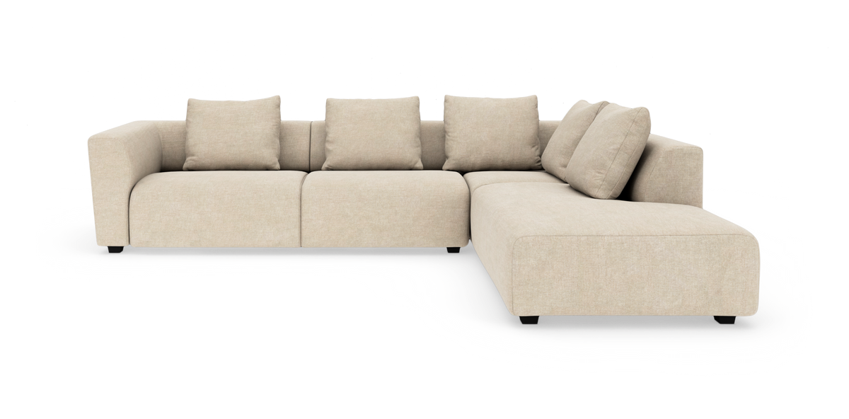Beige L-formet modulsofa med fem ryghynder på hvid studiobaggrund.
