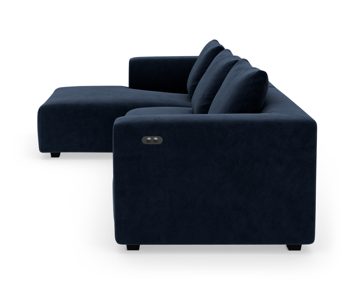 Mørkeblå modulsofa med chaiselong set fra siden med indbygget knapkontrol på armlænet.