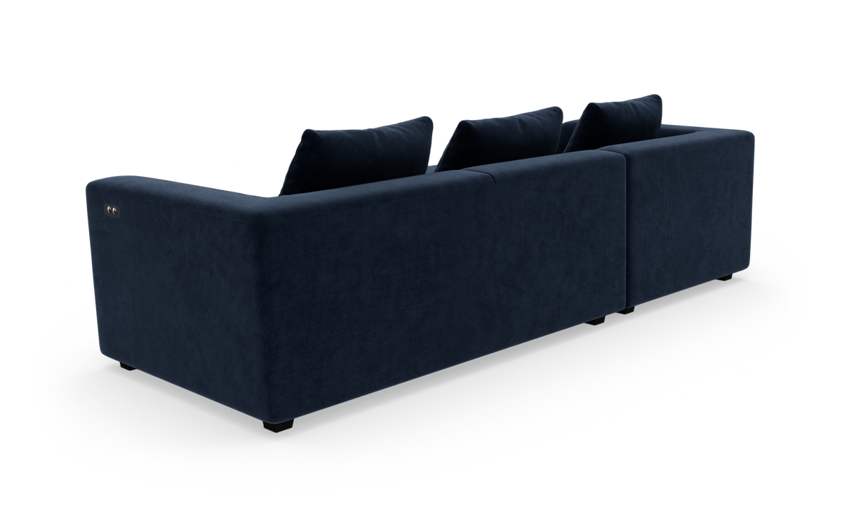 Mørkeblå tresæders modulsofa set bagfra mod hvid baggrund.