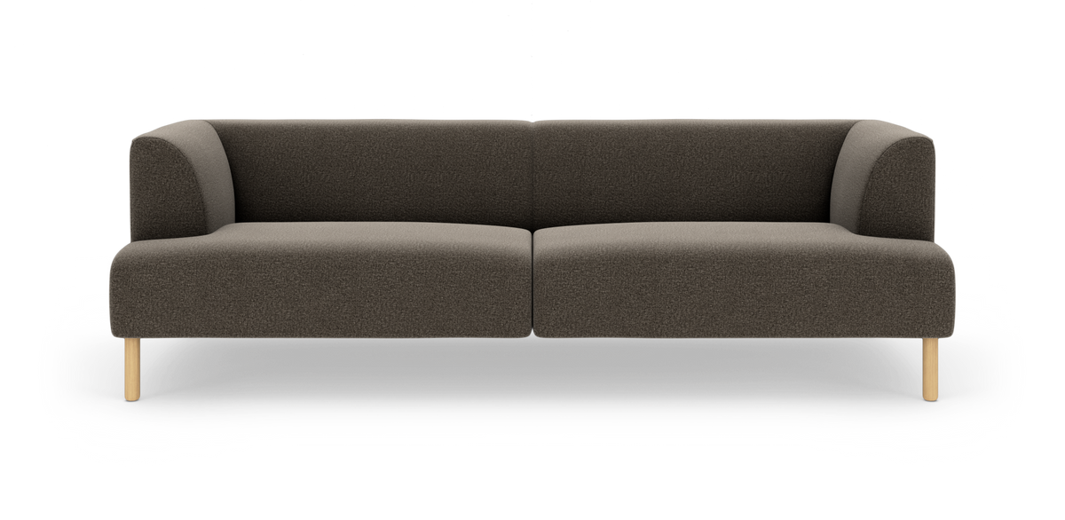Mørkegrå, moderne modulsofa med afrundede armlæn og lyse træben, frilagt på hvid baggrund.