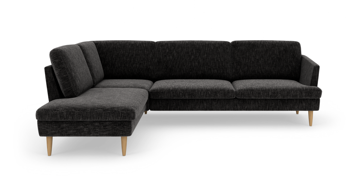 Mørkegrå L‑formet hjørnesofa i stof med venstrevendt chaiselong og lyse træben.
