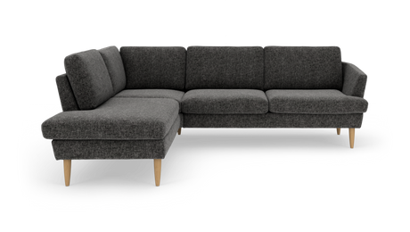 Mørkegrå L-sofa med chaiselong og lyse træben, frilagt på hvid baggrund.