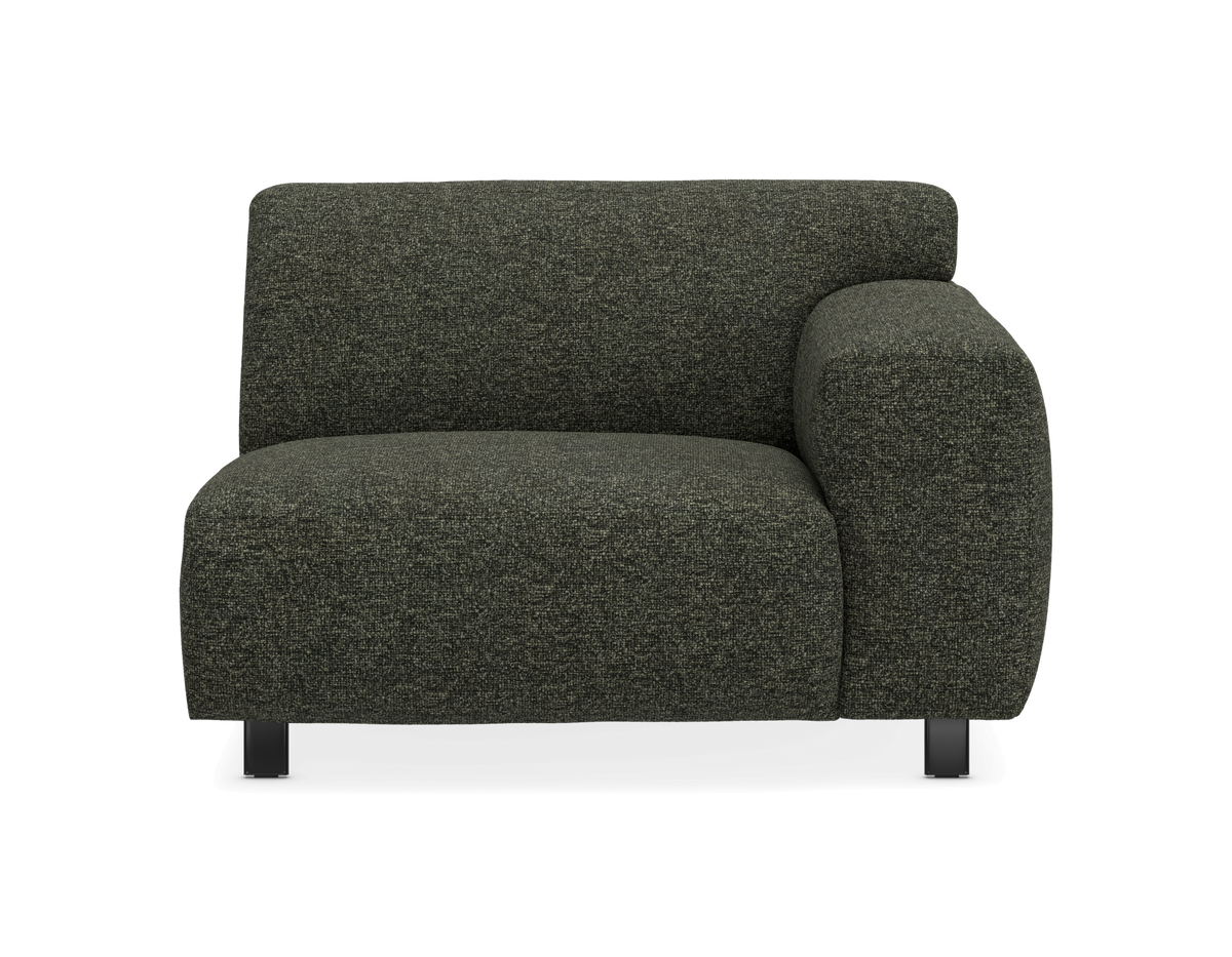 Grøn modulsofa med højre armlæn, kompakt form og sorte ben.