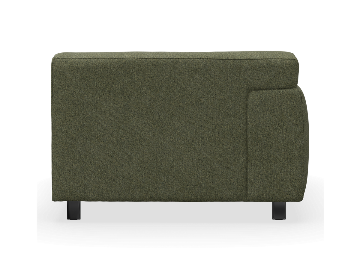 Grøn modulsofa set fra siden, armlæn til højre, isoleret på hvid baggrund.