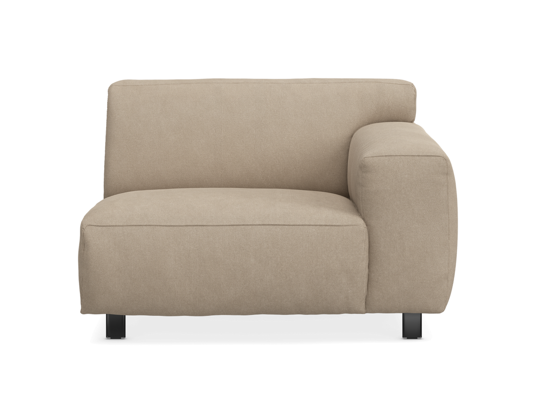 Beige modulsofa med højre armlæn og riflet betræk, frontvisning.
