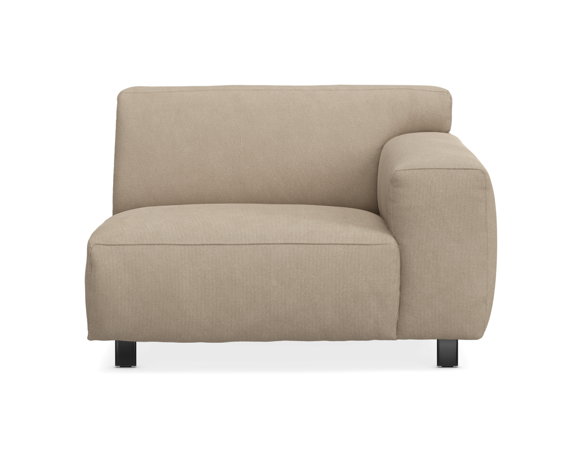 Beige modulsofa med højre armlæn og riflet betræk, frontvisning.