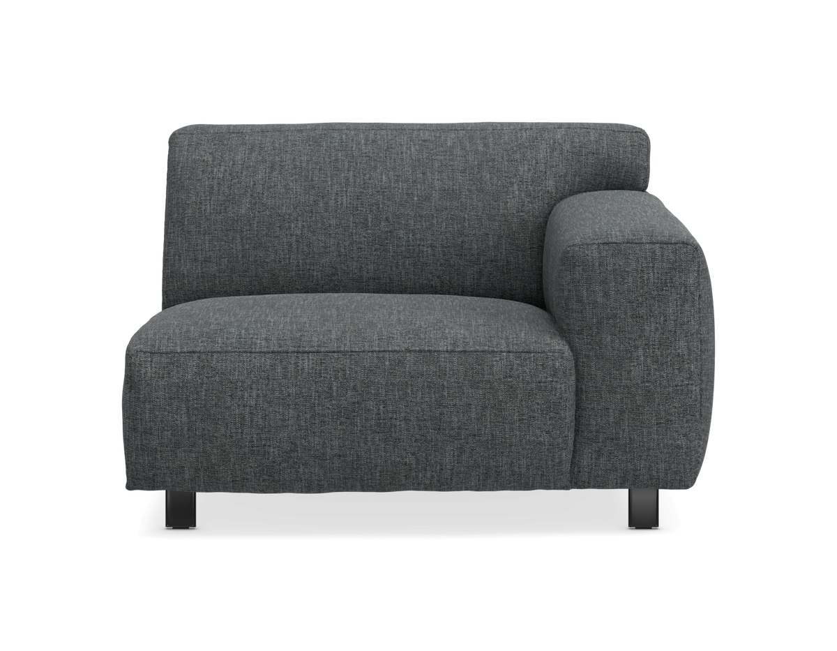 Modulsofa med højre armlæn i mørkegråt stof, set forfra på hvid baggrund.