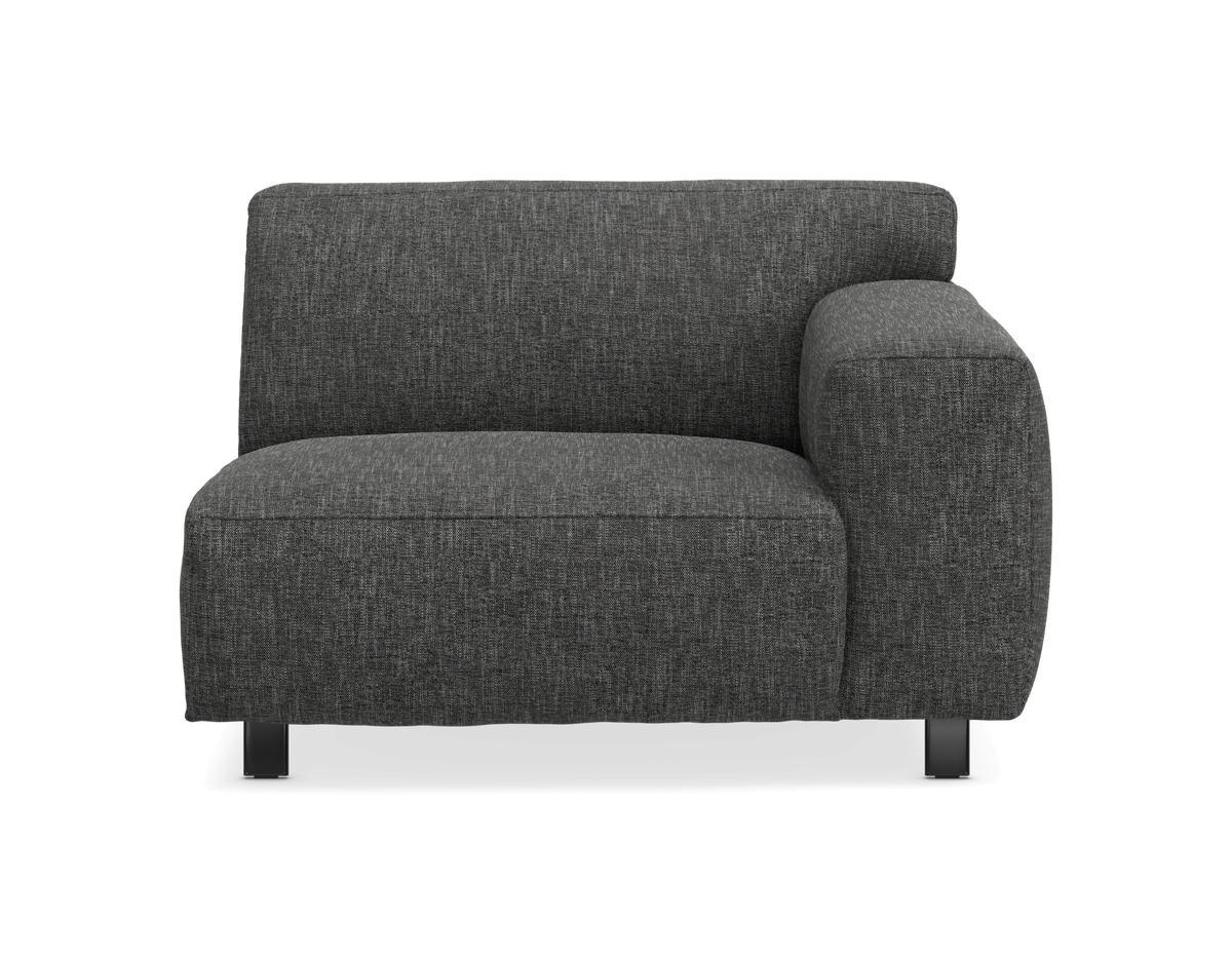 Mørkegrå modulsofa med højre armlæn, set forfra.