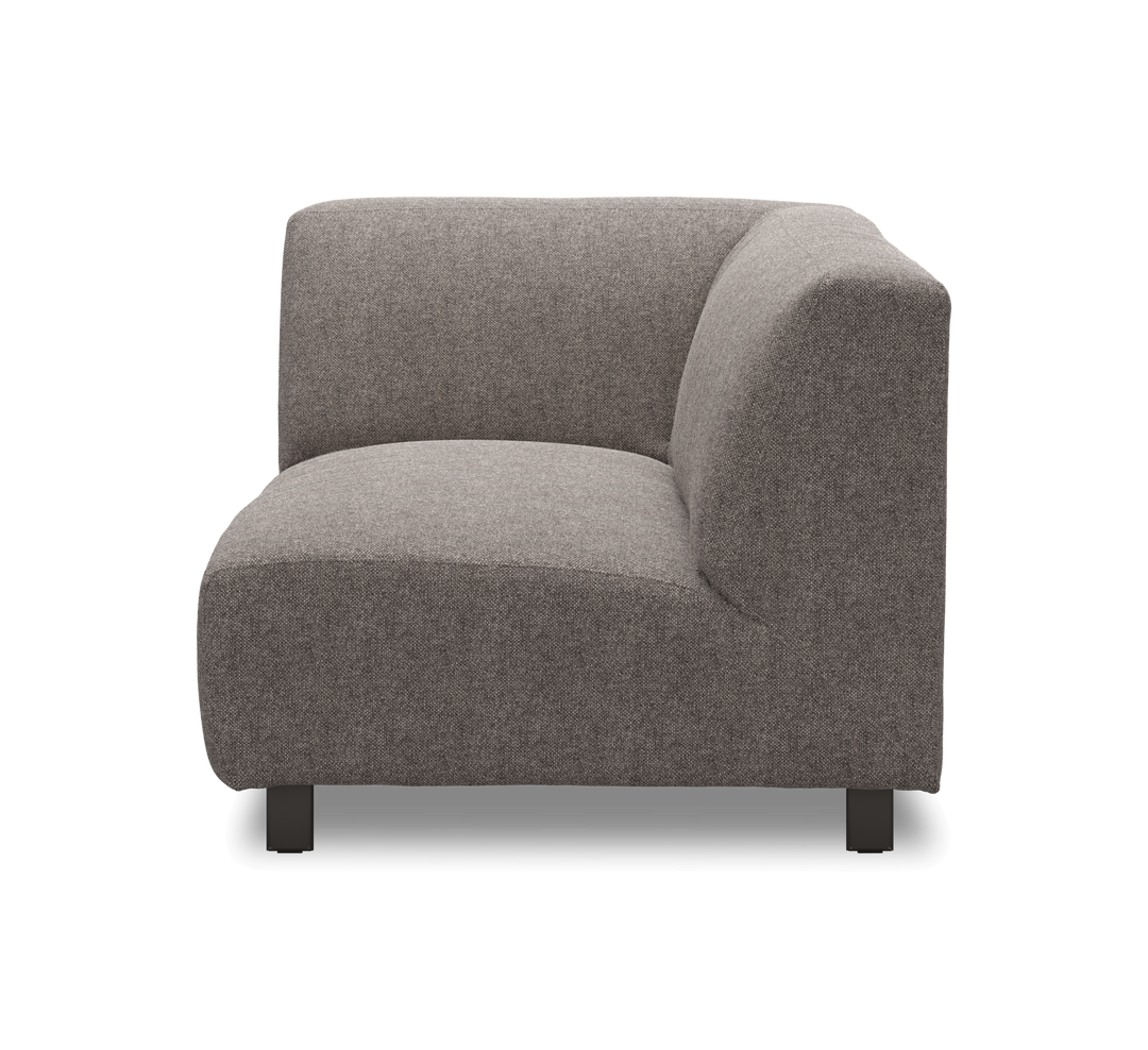 Modulsofa, hjørnesektion i gråt stof, frilagt forfra.