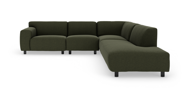 Mørkegrøn modulær hjørnesofa med afrundede former og sorte ben._ps