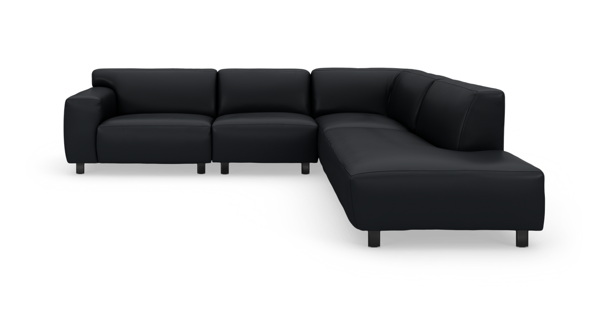 Sort L‑sofa i moderne design, modulsofa med chaiselong til højre.