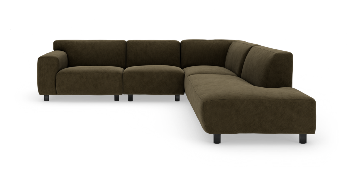 L‑formet modulsofa med brede sæder i mørk olivenbrun corduroy, vist i skråt frontperspektiv.