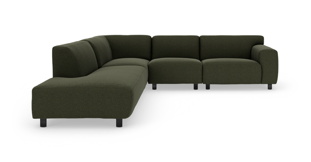 Mørkegrøn modul-hjørnesofa med bløde, afrundede former og sorte ben, frilagt på hvid baggrund.