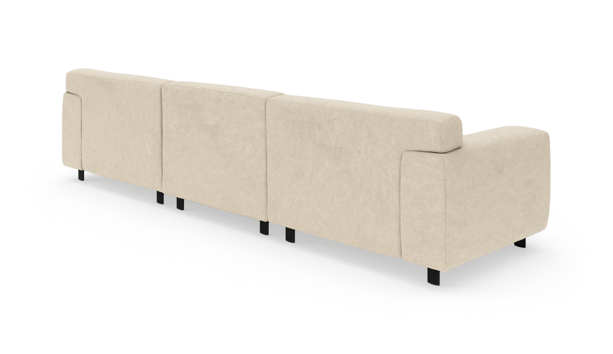 Beige modulsofa med armlæn til højre, set bagfra og frilagt på hvid baggrund.