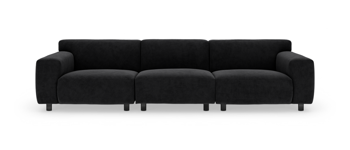 Sort firesædet modulsofa i stof set forfra mod hvid studiebaggrund.