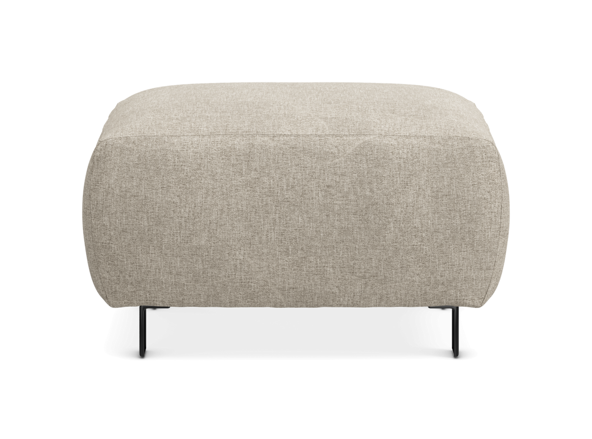 Beige puf i stof med sorte metalben, set forfra.