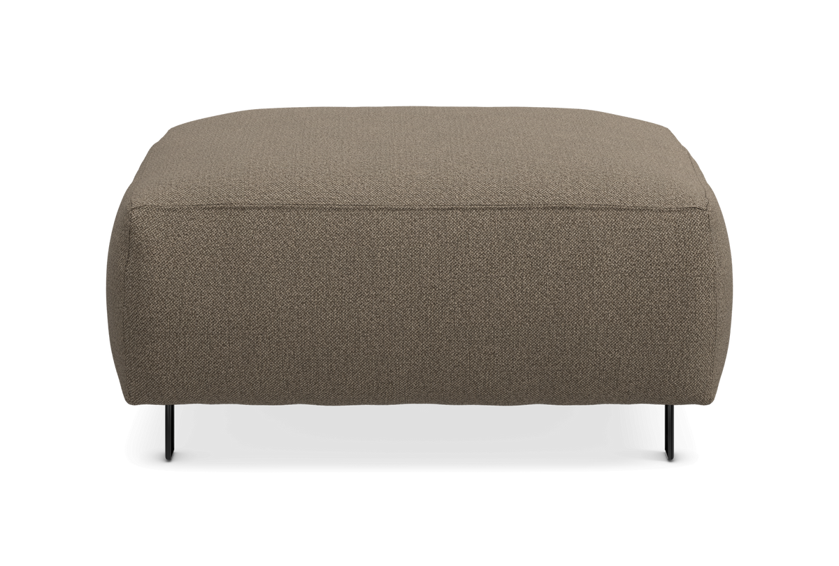 Rektangulær puf/ottoman i taupe stof med slanke sorte ben, set forfra.