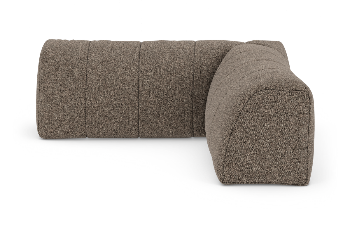 Modulær hjørne-/endestykke-sofa i brunmeleret tekstil med afrundede former, fotograferet i studie på hvid baggrund.