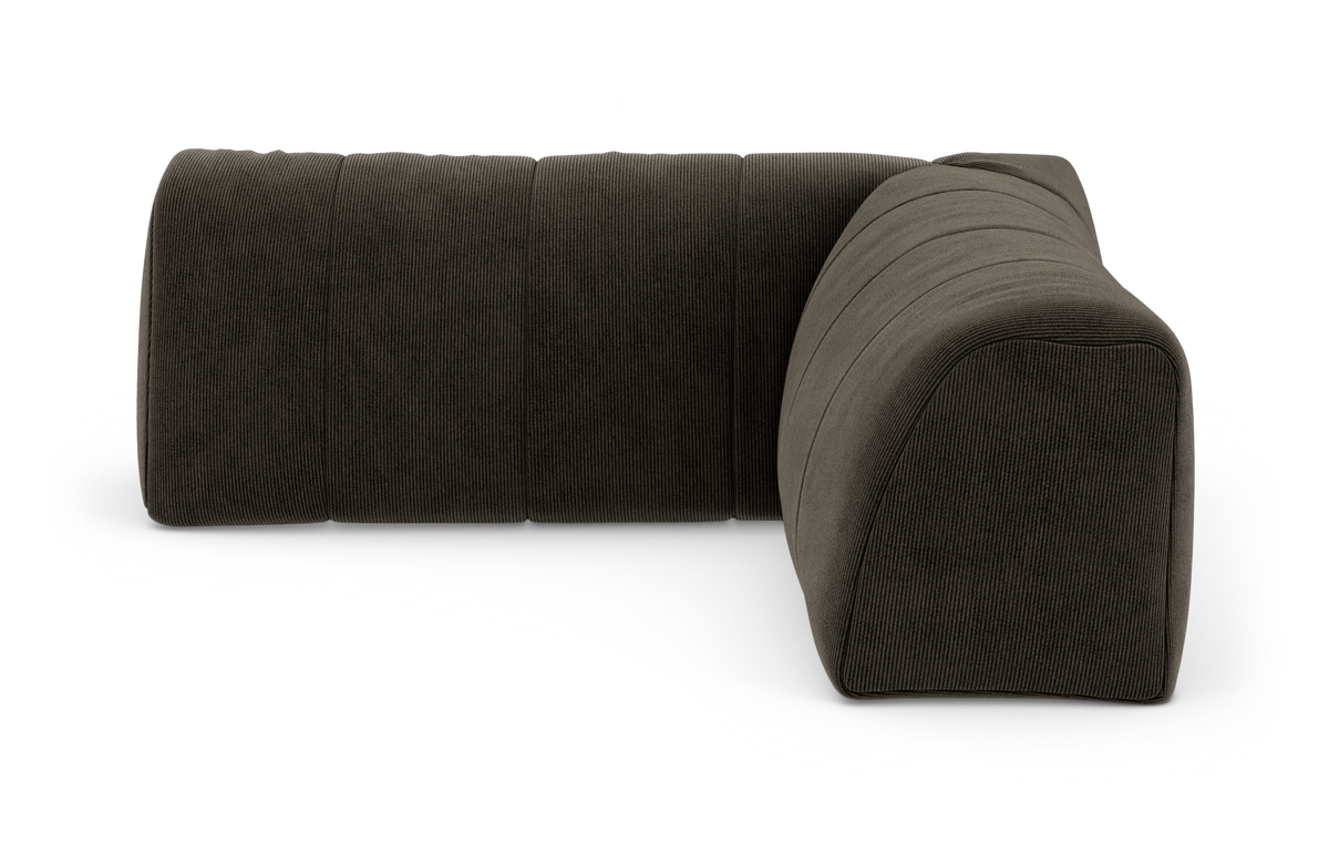 Mørkegrå L-formet modulsofa i fløjl/corduroy, fritlagt på hvid baggrund.