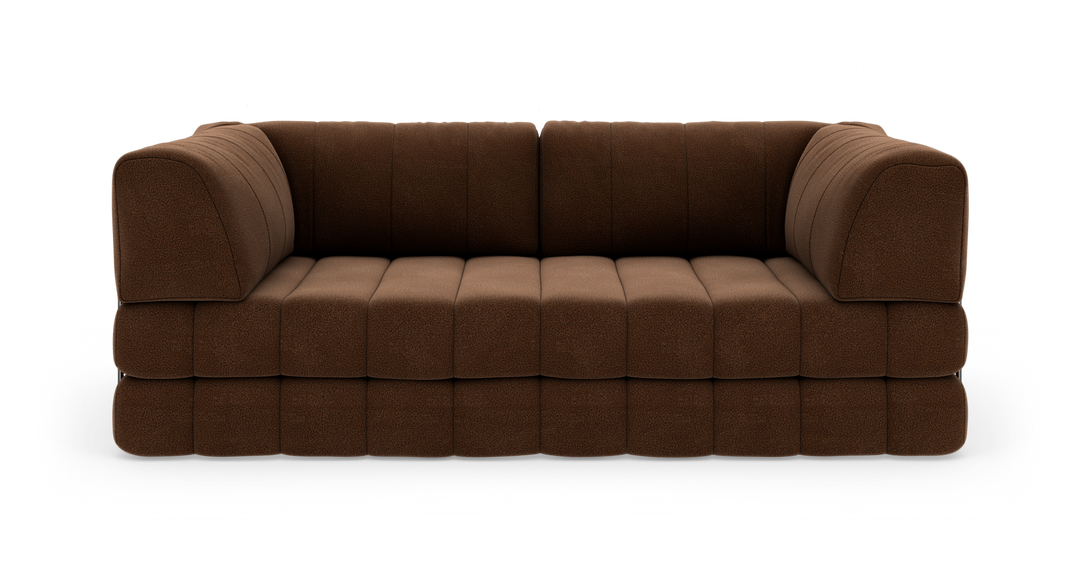 Brun modulsofa i stof med afrundede hjørner, frontvisning, frilagt på hvid baggrund.