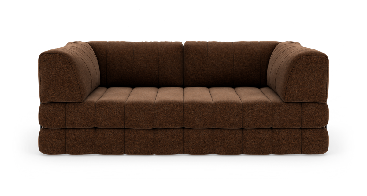 Brun modulsofa i stof med afrundede hjørner, frontvisning, frilagt på hvid baggrund.