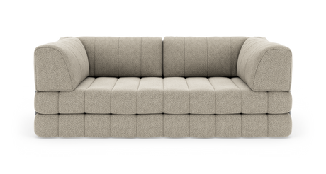 Beige modulsofa med afrundede armlæn i bouclé-lignende stof, fotograferet forfra på hvid baggrund.