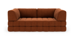 Rustbrun modulsofa i stof set direkte forfra, fritstående mod hvid baggrund.