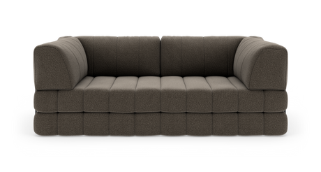 Modulsofa i mørkegrå/brun tekstil med dybe quiltede sæder og afrundede armlæn, fritlagt på hvid baggrund.
