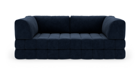 Mørkeblå modulsofa i plys/cordstof, set direkte forfra mod hvid baggrund.