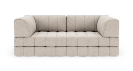 Beige modulsofa med kraftigt polstrede blokpuder og afrundede hjørner, frilagt på hvid baggrund.