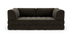 Mørkebrun, modulær 3-personers sofa i bredriflet fløjl, fritlagt på hvid baggrund med bløde, blokformede hynder og afrundede armlæn.