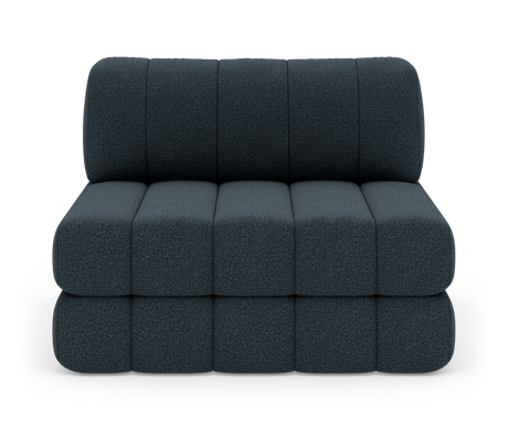 Modulsofa i mørkeblåt tekstil, frontvisning med afrundede, puffede sektioner på hvid baggrund.